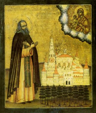 Преподобный Иосиф Волоцкий в молении на фоне монастыря